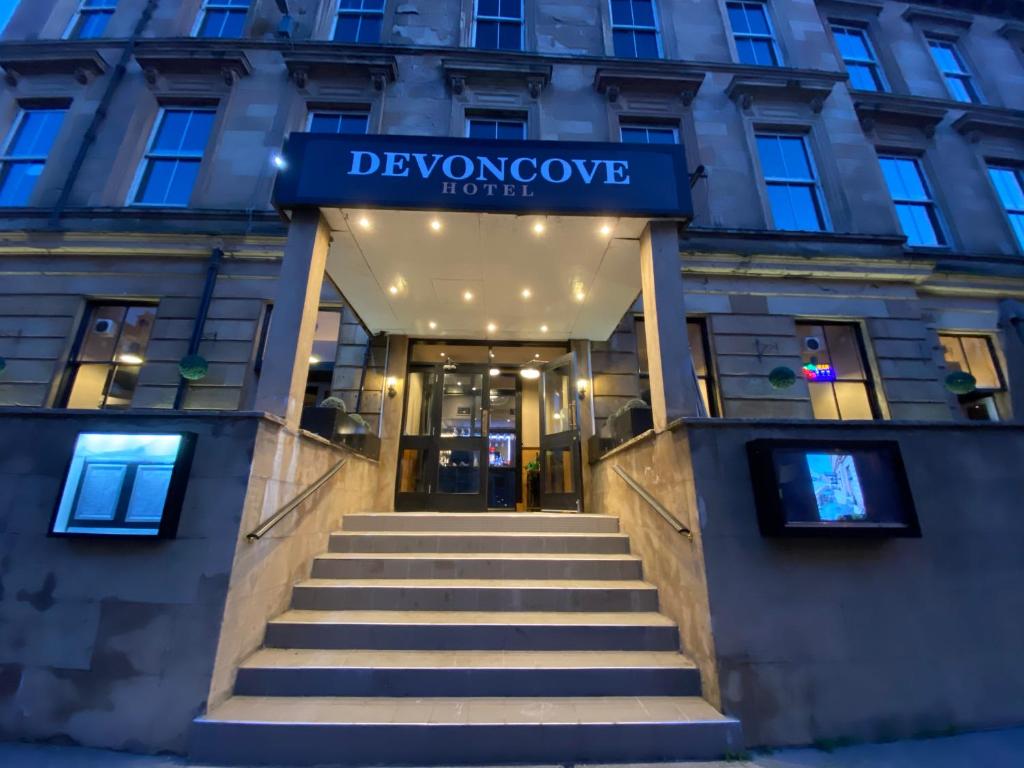a building with a sign that reads devoniachoes hotel at Devoncove Hotel Glasgow in Glasgow