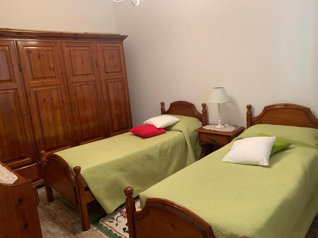 Posteľ alebo postele v izbe v ubytovaní Casa Caterina in centro