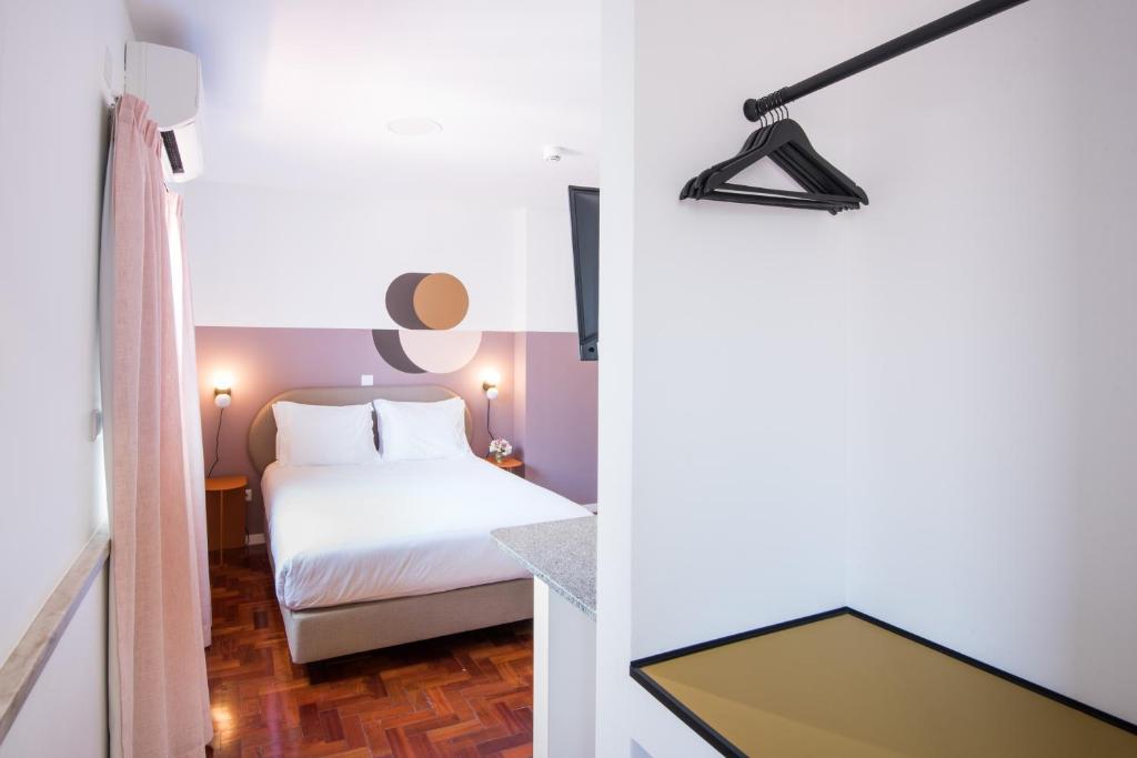 Postel nebo postele na pokoji v ubytování Lisbon Serviced Apartments - Campos