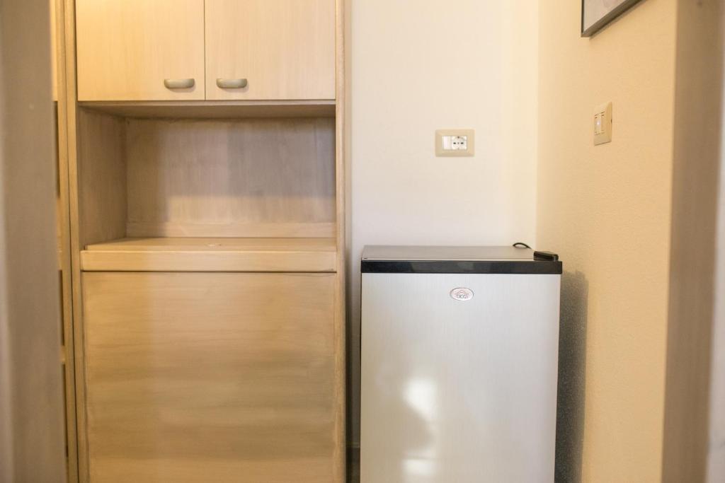 Kuchyň nebo kuchyňský kout v ubytování B&B La Quercia Budoni, Tanaunella