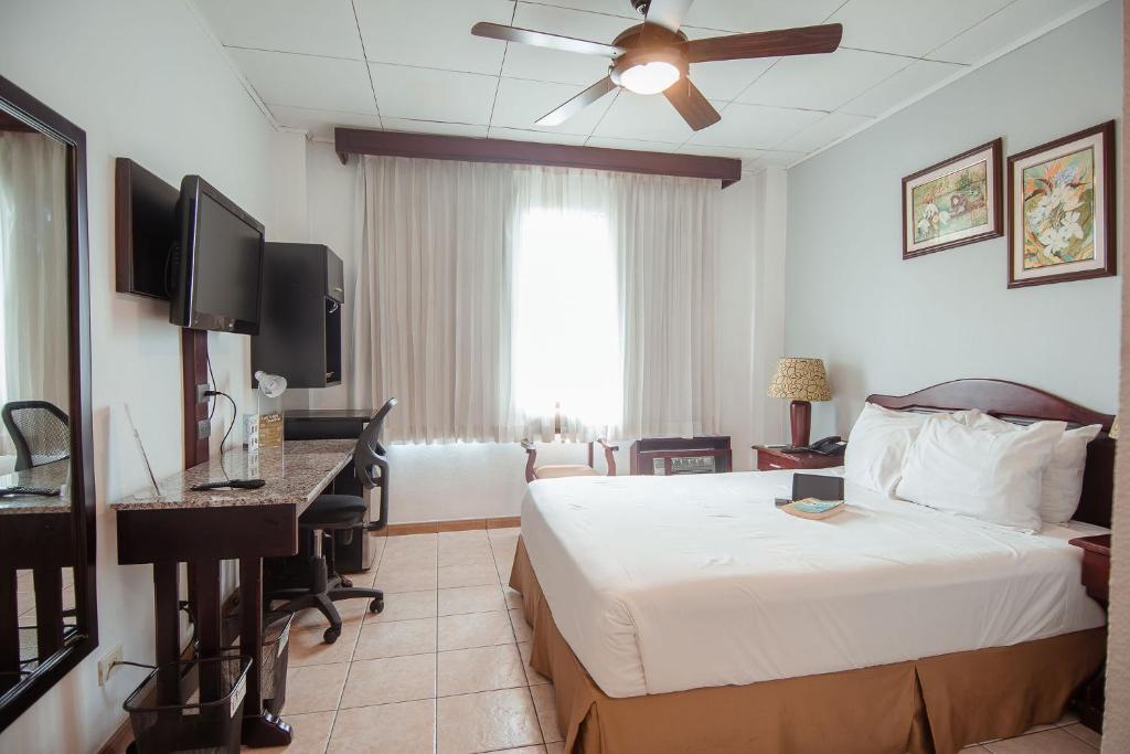 Postel nebo postele na pokoji v ubytování La Sabana Hotel Suites Apartments