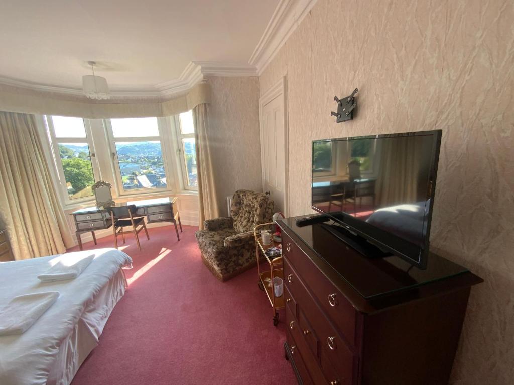 TV o dispositivi per l'intrattenimento presso Dunrigh Guest House