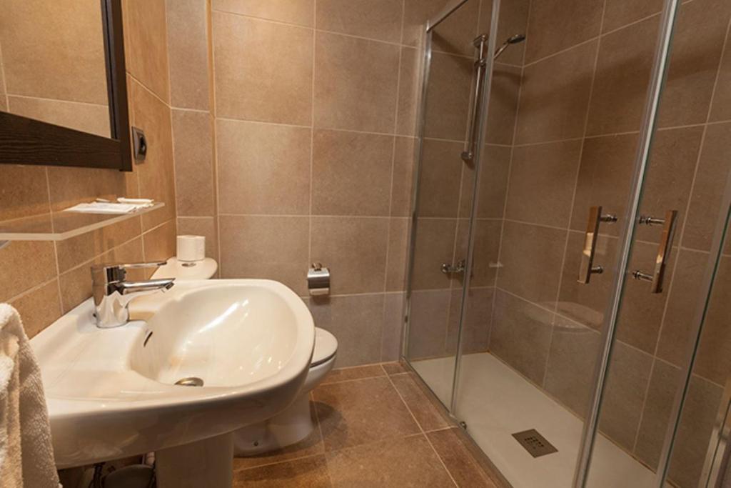 Koupelna v ubytování Hotel Alegret