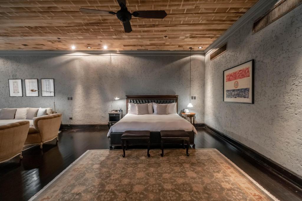Postel nebo postele na pokoji v ubytování Factoria Hotel