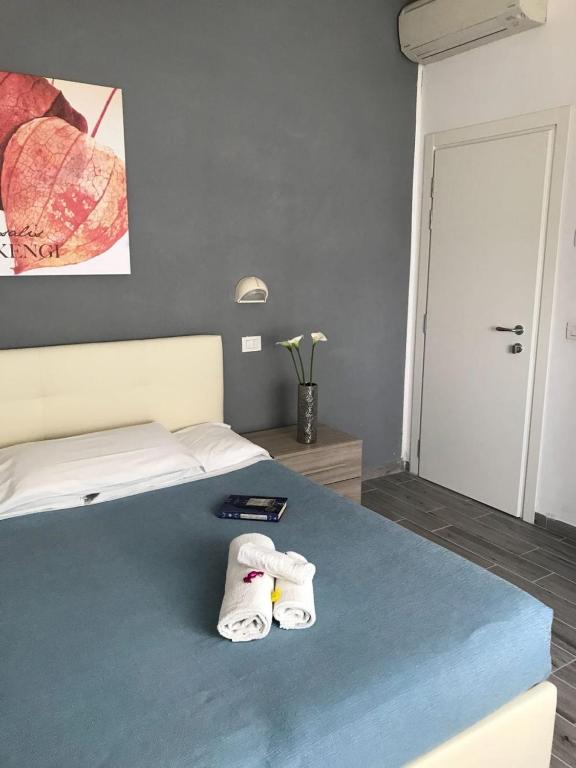 Postel nebo postele na pokoji v ubytování HOTEL VENUS