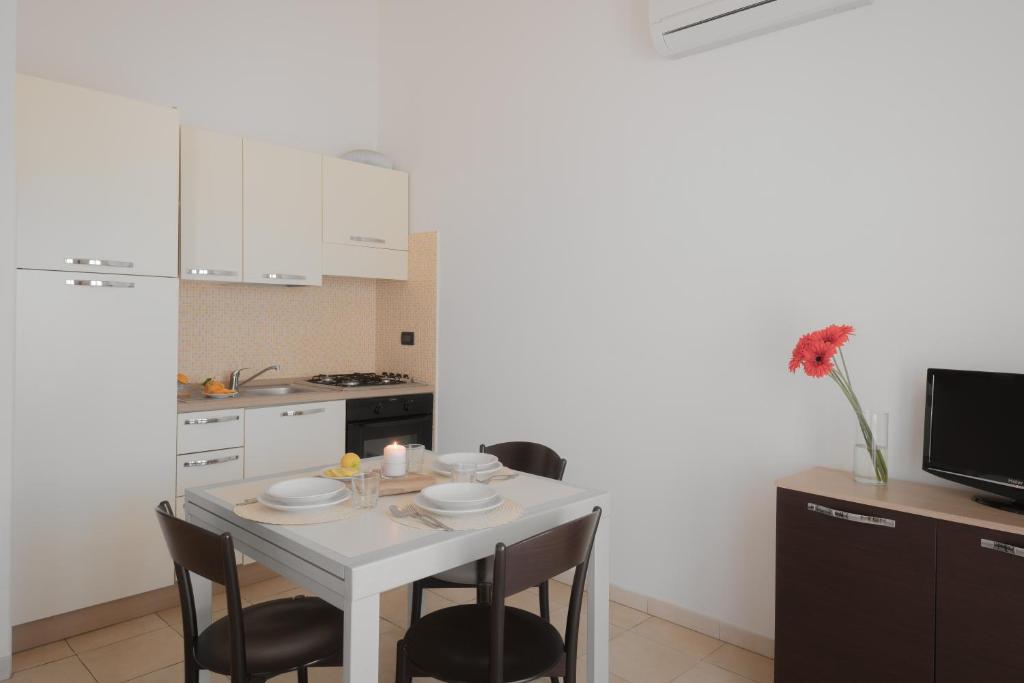 Kuchyň nebo kuchyňský kout v ubytování Residence Le Fontane