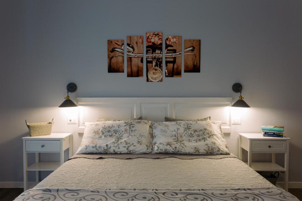 Postel nebo postele na pokoji v ubytování La Bicicletta Rooms