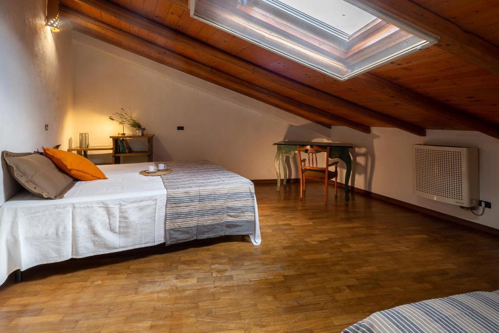 Un pat sau paturi într-o cameră la Casa La Palombara
