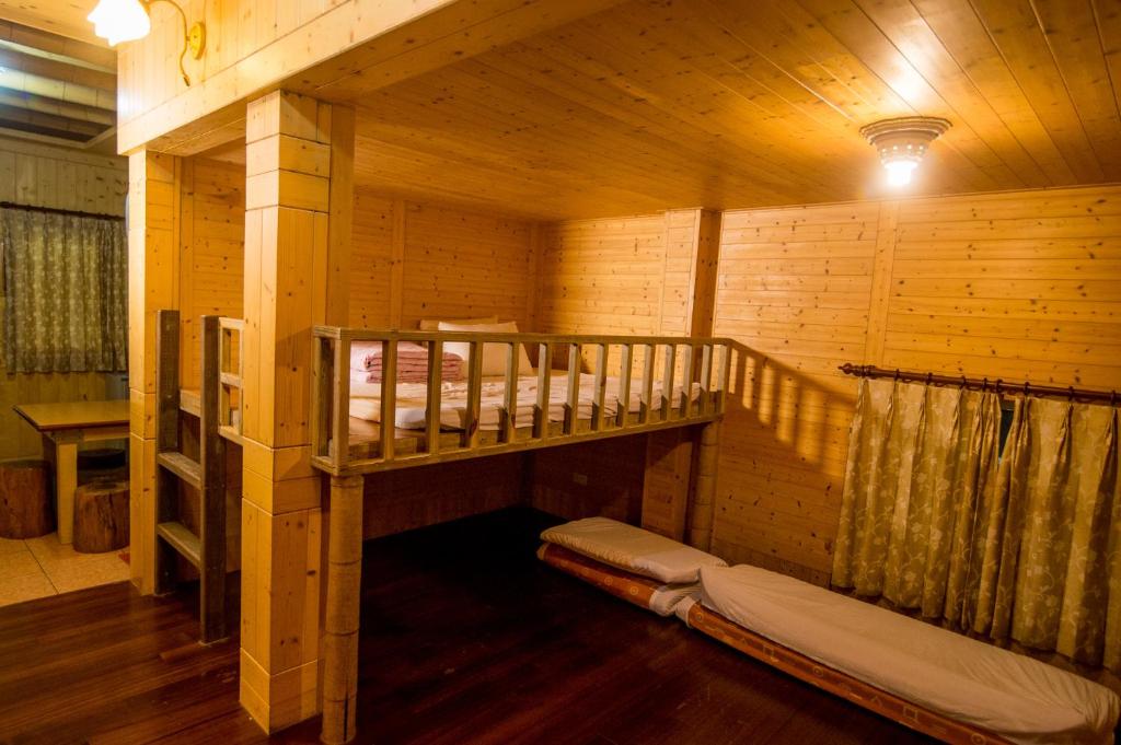 
A bunk bed or bunk beds in a room at Yi Xin Homestay
