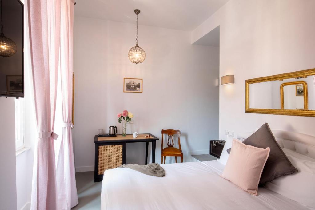 Posteľ alebo postele v izbe v ubytovaní Guesthouse Serafino