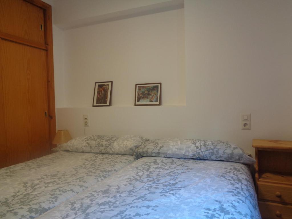 Postel nebo postele na pokoji v ubytování APARTMENT NATURA