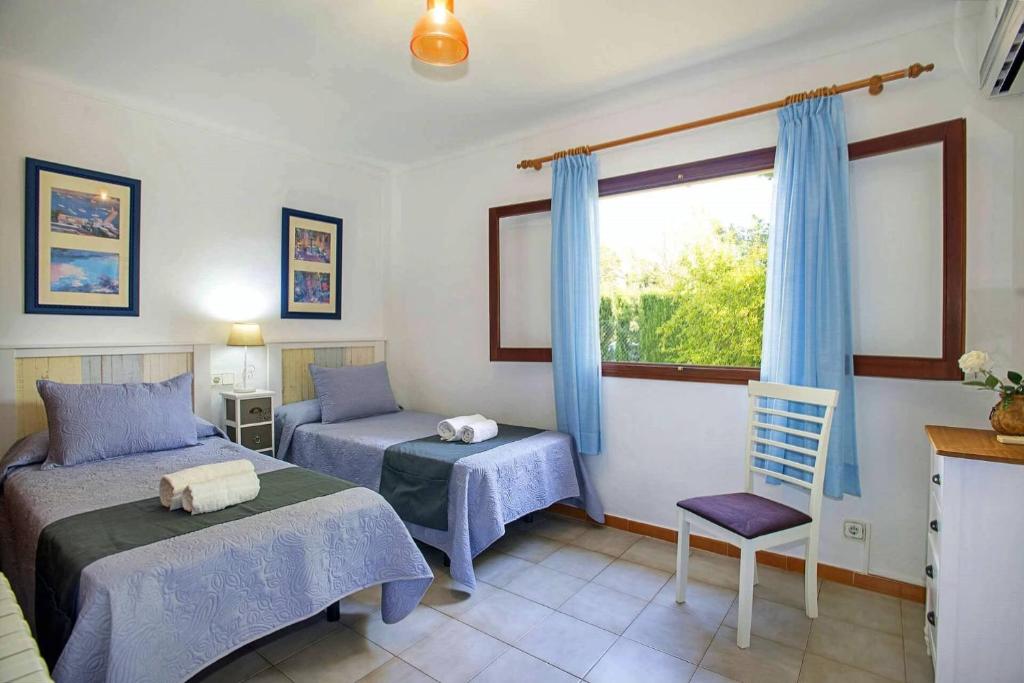 A bed or beds in a room at Villa Gotmar by Sealand Villas
