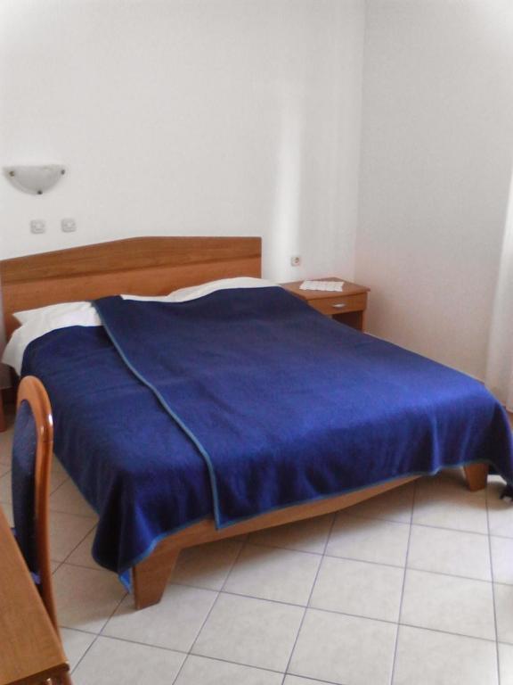 Postel nebo postele na pokoji v ubytování Guest House Frane