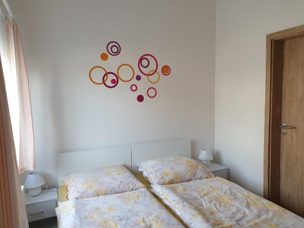 Postel nebo postele na pokoji v ubytování Penzion a hospůdka U Anny