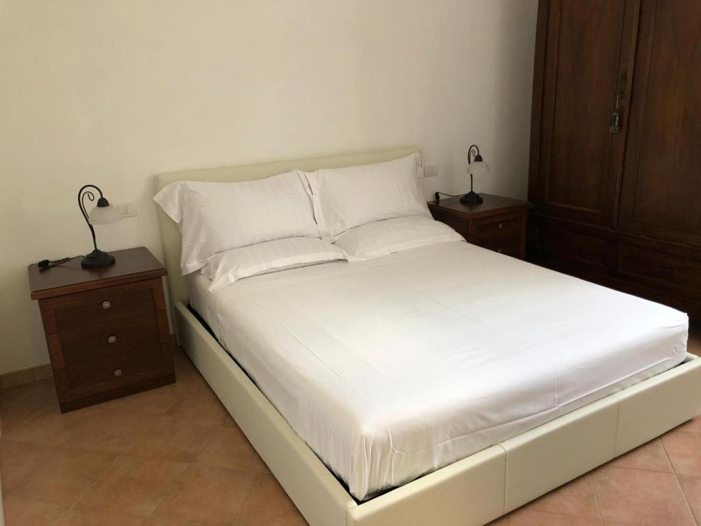 Postel nebo postele na pokoji v ubytování B&B Giulia
