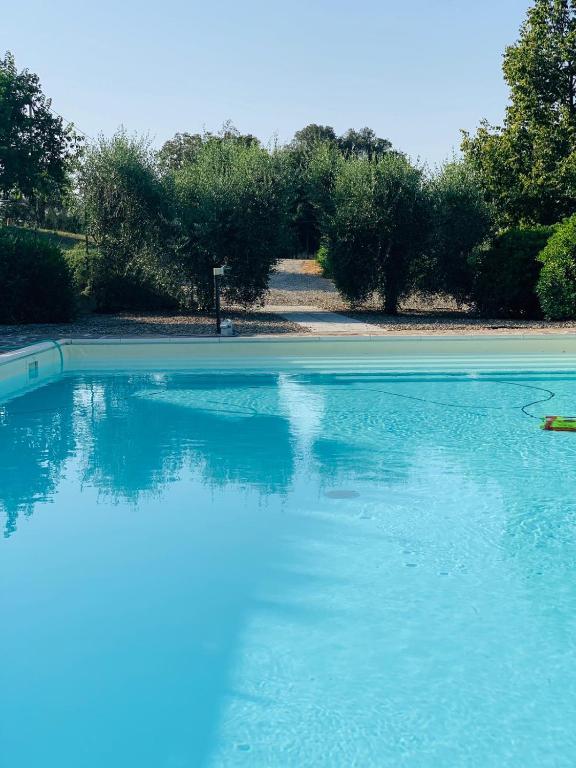 Bazén v ubytování Tenuta Montemassi Podere Montauzzo nebo v jeho okolí