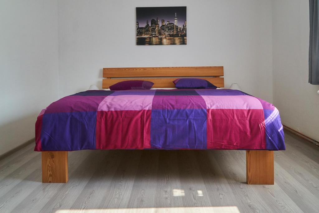 Postel nebo postele na pokoji v ubytování Apartmány Marjánka