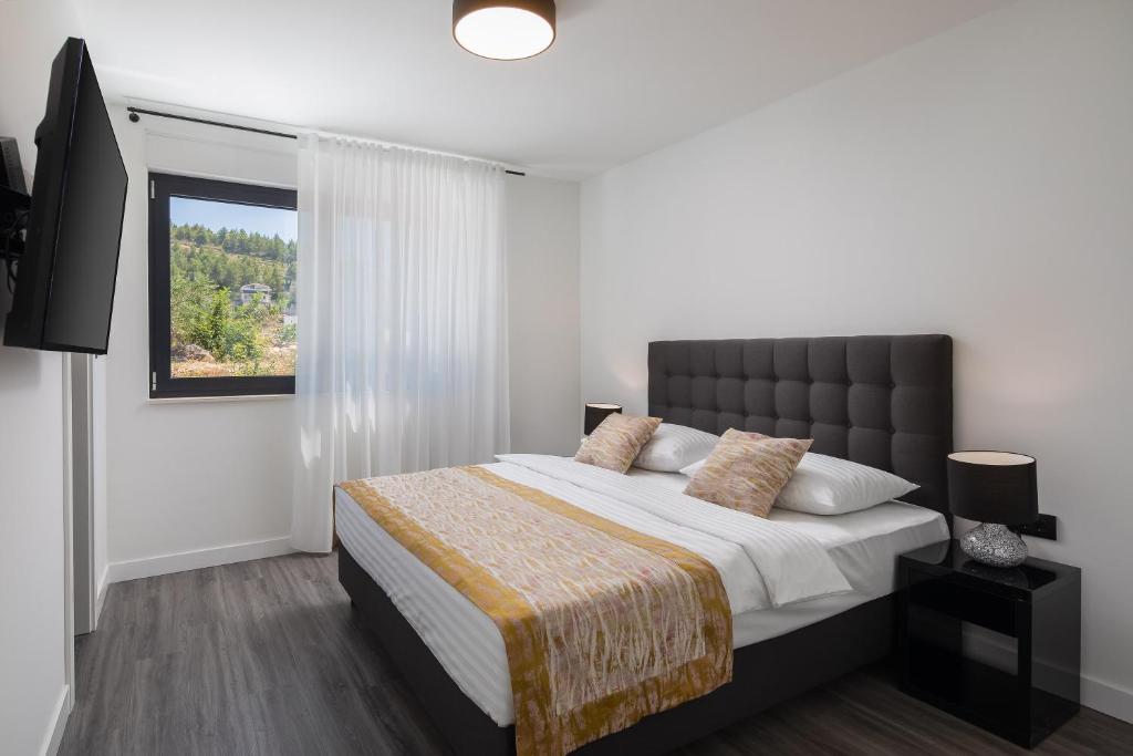 Postel nebo postele na pokoji v ubytování Villa 9