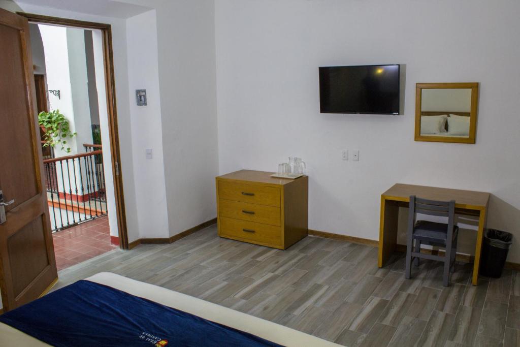 TV a/nebo společenská místnost v ubytování Hotel Real de Castilla Colonial
