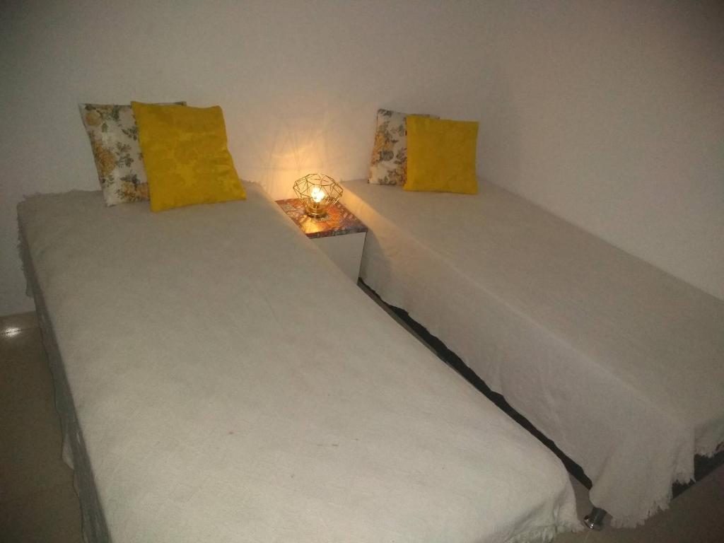 Ένα ή περισσότερα κρεβάτια σε δωμάτιο στο Apt Campo Grande/Res. Árvores4-Prox. Park Shopping