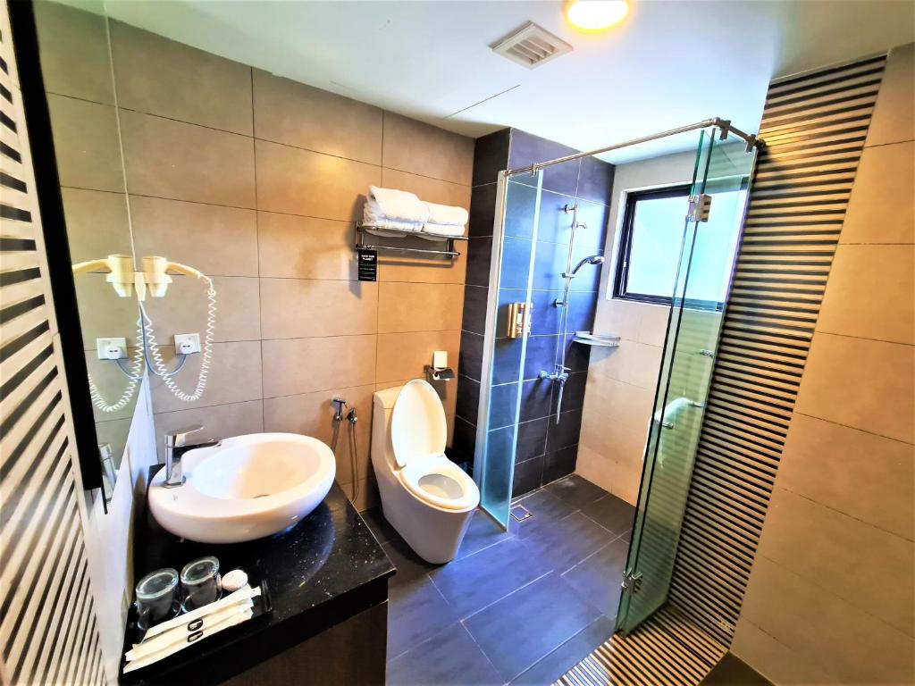 Koupelna v ubytování Nexus Business Suite Hotel
