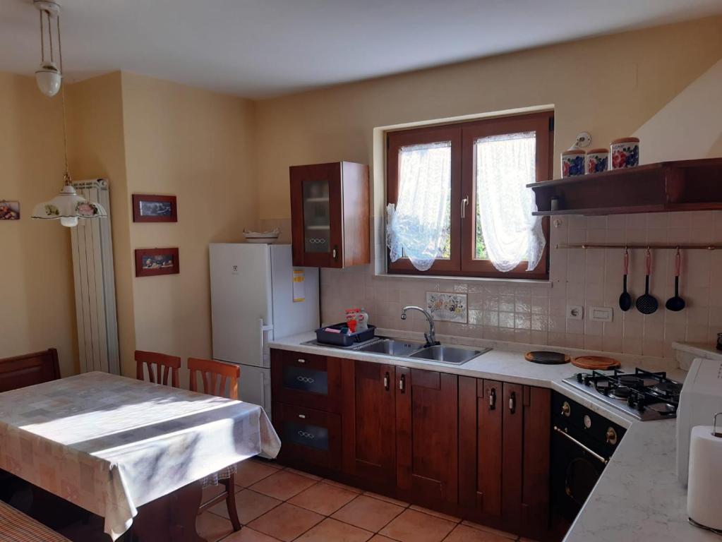Kuchyň nebo kuchyňský kout v ubytování Apartman Lena Umag
