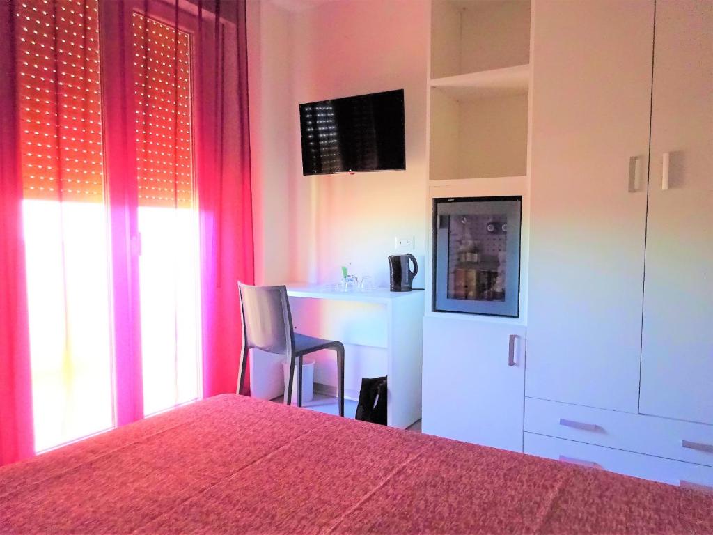 TV a/nebo společenská místnost v ubytování Hotel Lem-Casadei