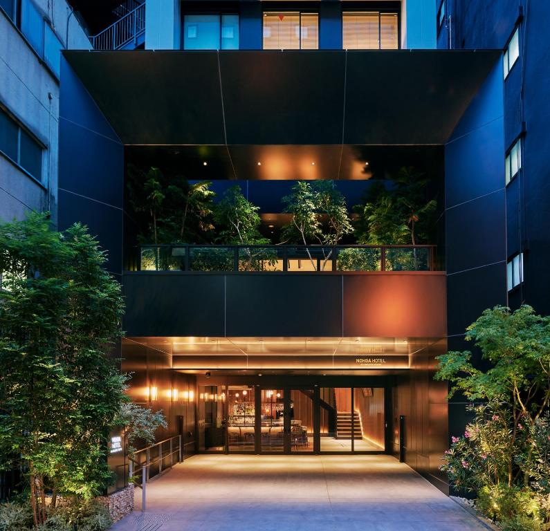 an external view of a building with plants at NOHGA HOTEL AKIHABARA TOKYO in Tokyo