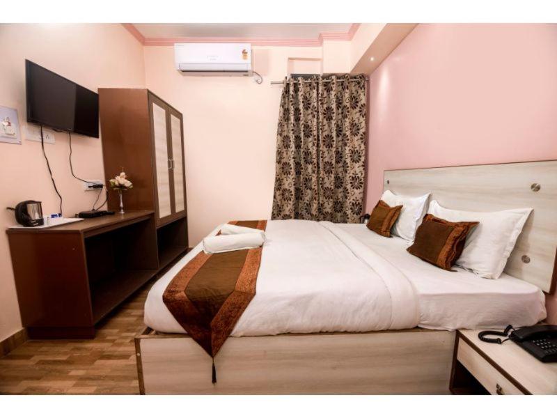 Postel nebo postele na pokoji v ubytování Hotel Bleue Mont