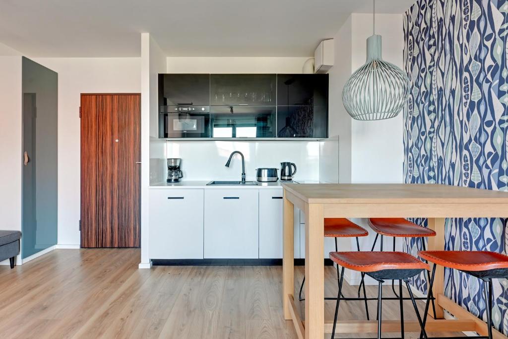 Kuchyňa alebo kuchynka v ubytovaní GRANO FLATS Gdańsk - Chmielna 73