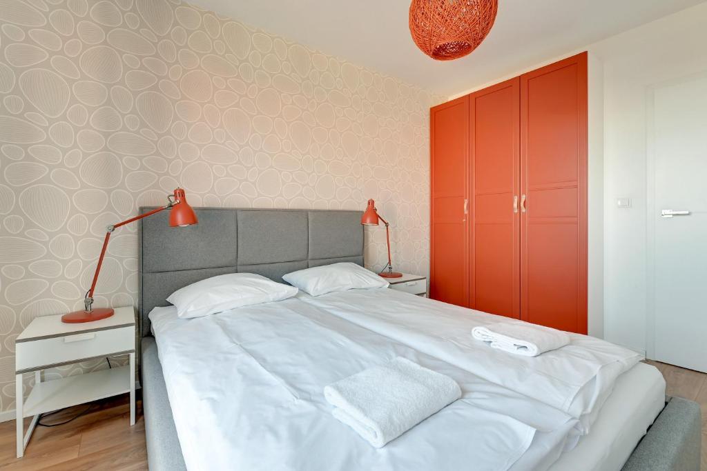 Posteľ alebo postele v izbe v ubytovaní GRANO FLATS Gdańsk - Chmielna 73