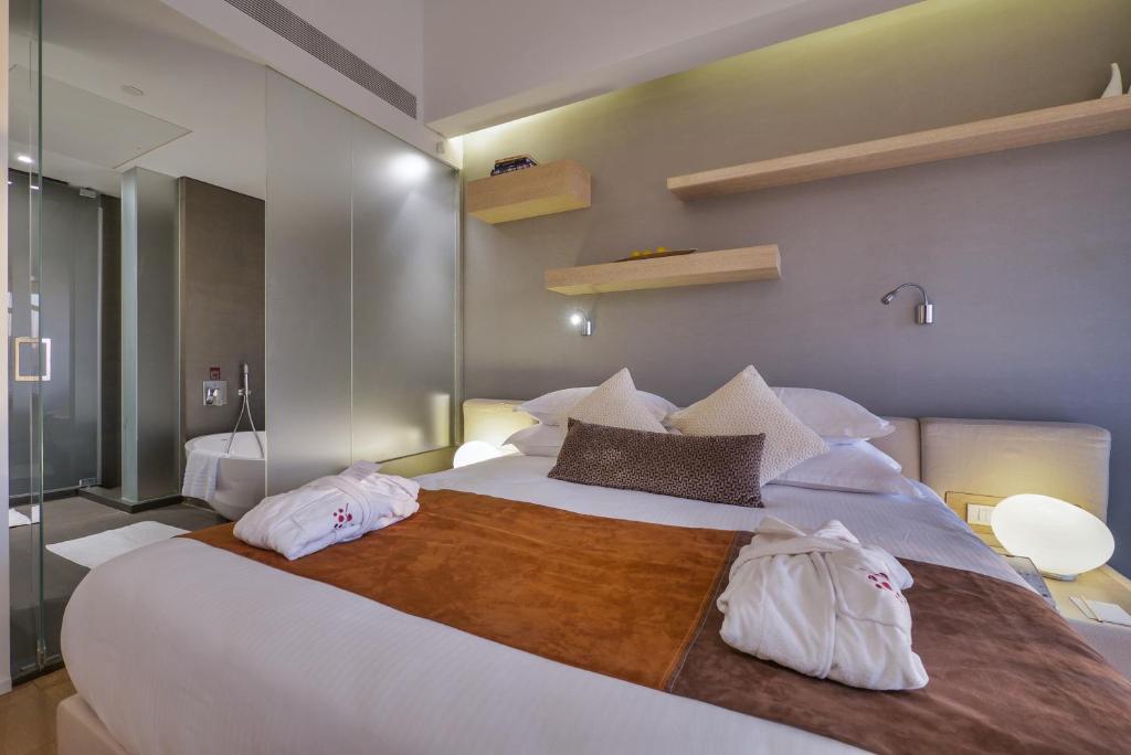 Postel nebo postele na pokoji v ubytování Cramim by Isrotel Exclusive
