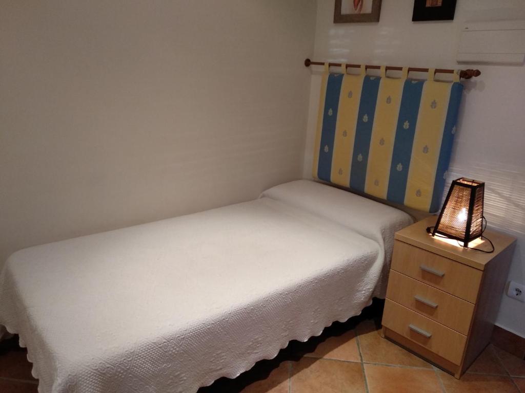 A bed or beds in a room at Pension zelaigane
