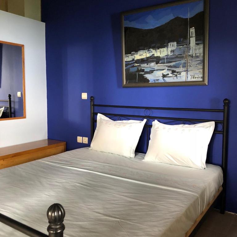 Postel nebo postele na pokoji v ubytování Tajo VIllas