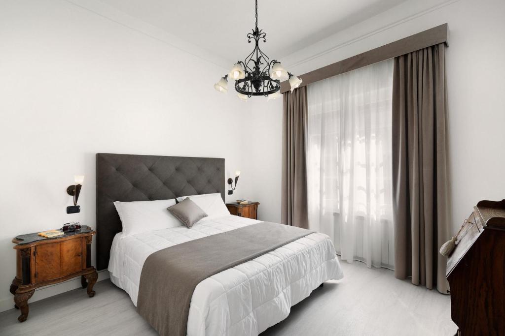 Postel nebo postele na pokoji v ubytování Hotel Berna