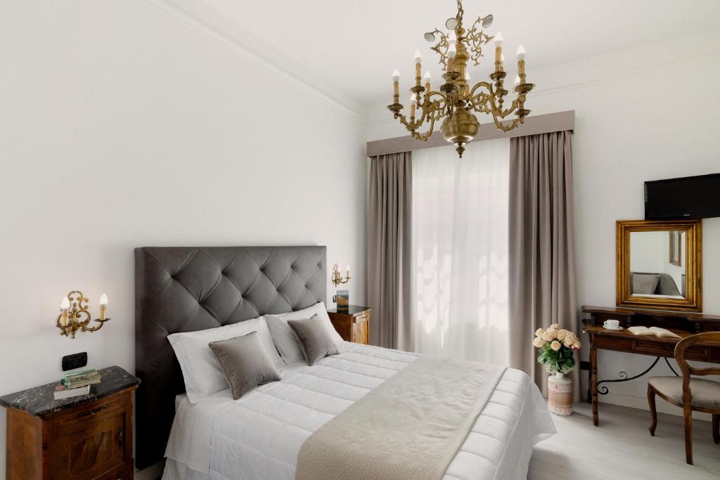 Postel nebo postele na pokoji v ubytování Hotel Berna