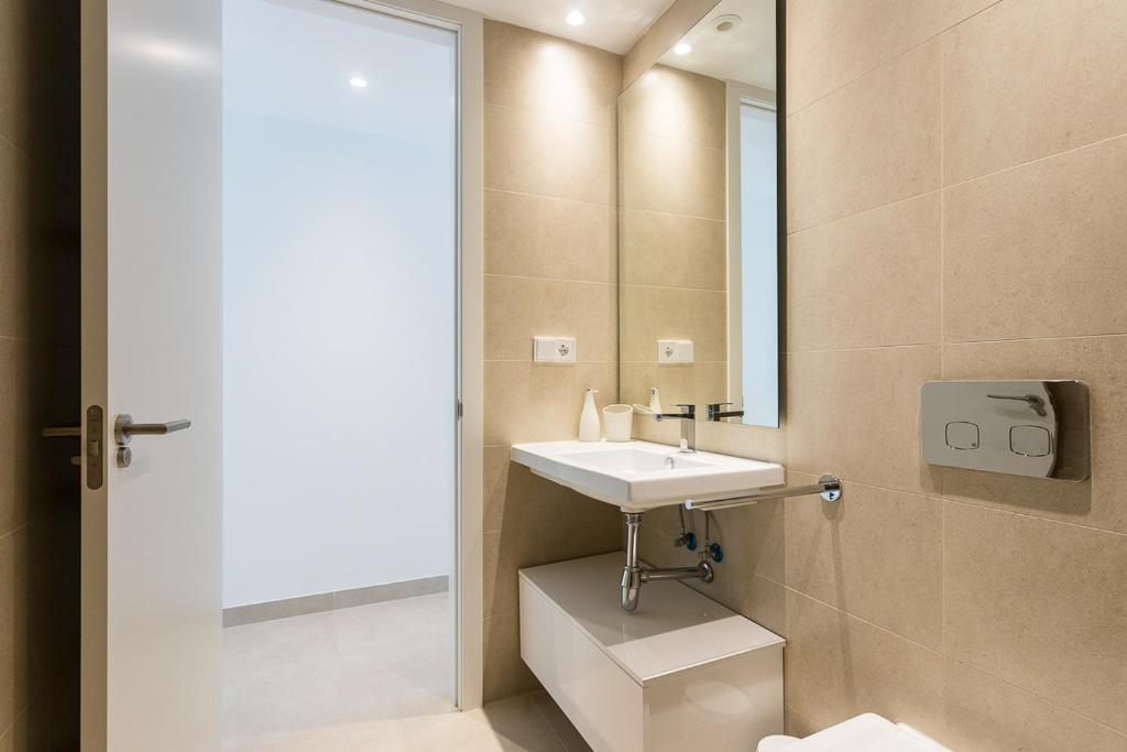 Kúpeľňa v ubytovaní ApartUP Denia Beachfront Deluxe