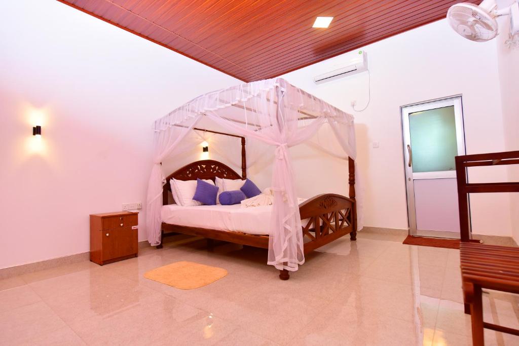 Postel nebo postele na pokoji v ubytování Ariya Rest & Ayurveda spa