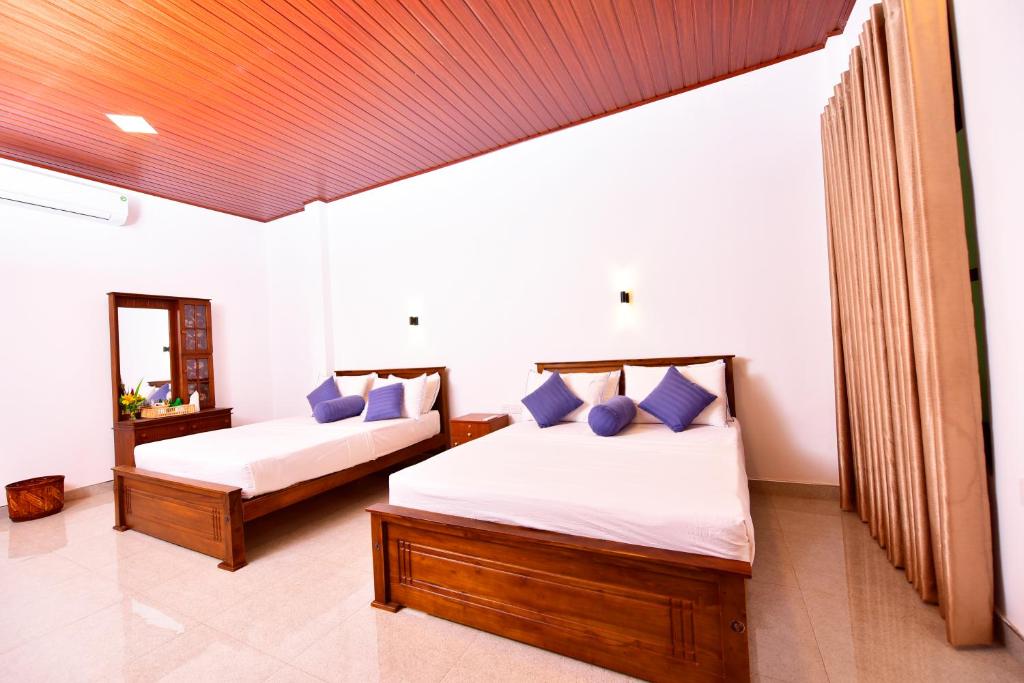 Postel nebo postele na pokoji v ubytování Ariya Rest & Ayurveda spa