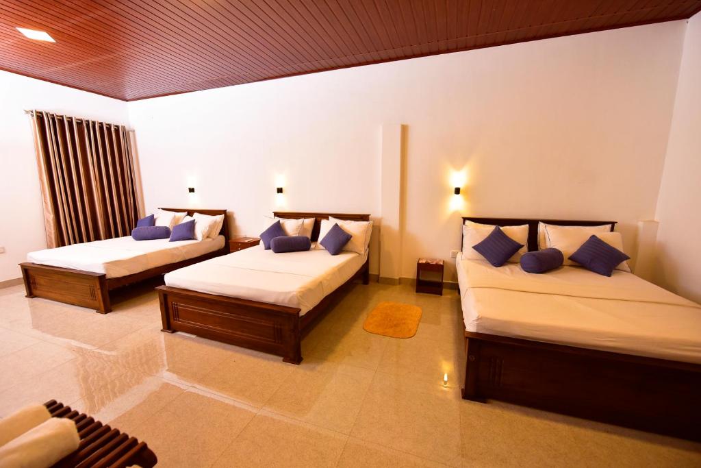 Postel nebo postele na pokoji v ubytování Ariya Rest & Ayurveda spa