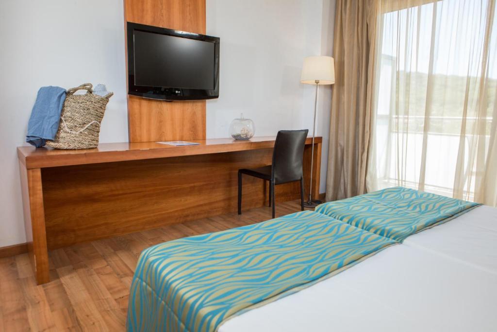 Postel nebo postele na pokoji v ubytování RVHotels Nautic Park
