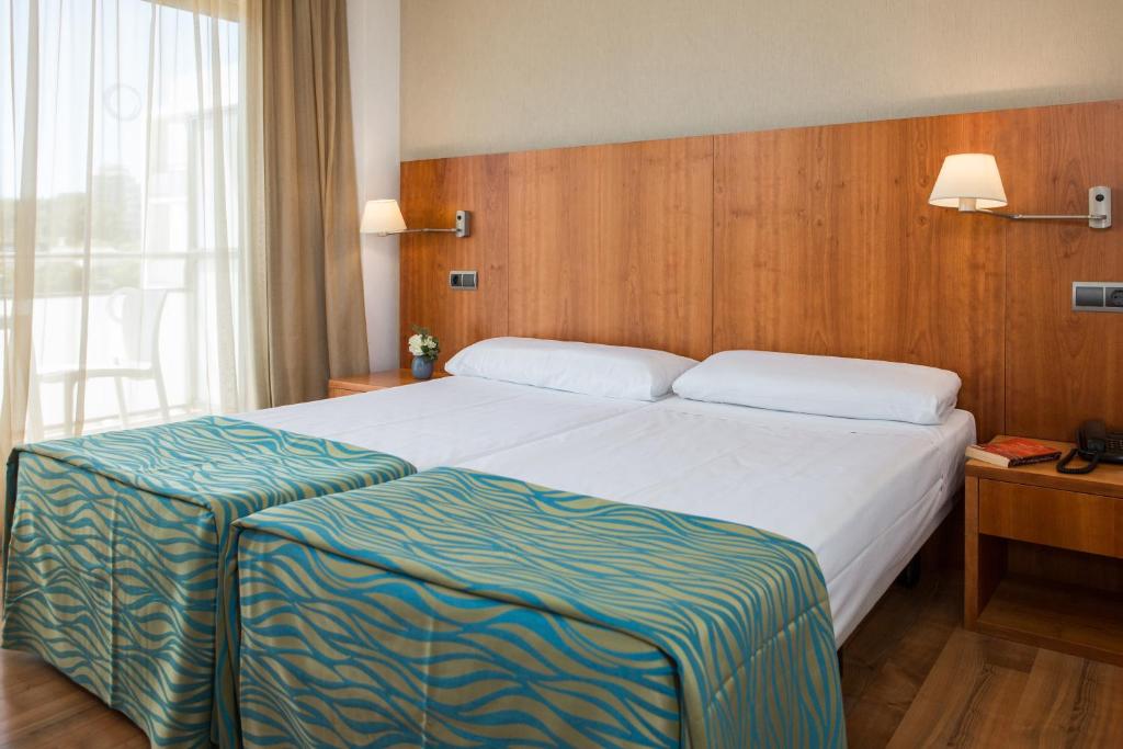 Postel nebo postele na pokoji v ubytování RVHotels Nautic Park
