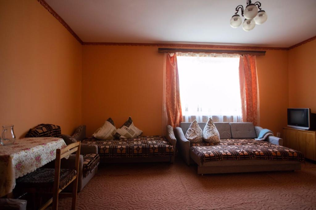 Postel nebo postele na pokoji v ubytování Guest House in Drachino