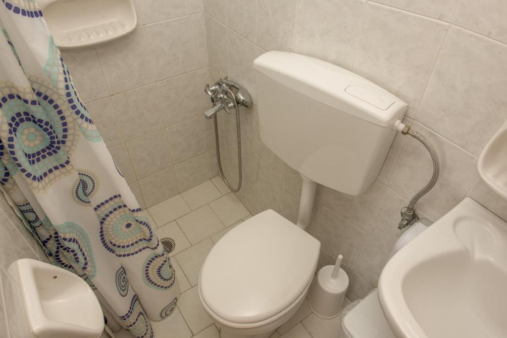 Kúpeľňa v ubytovaní Nikos Rooms