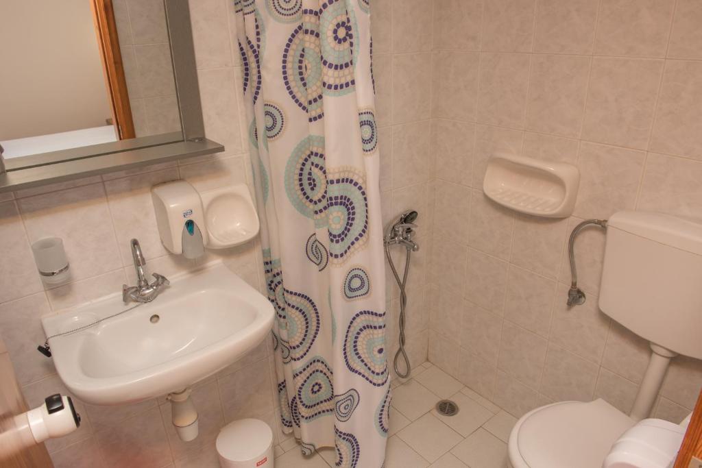 Kúpeľňa v ubytovaní Nikos Rooms
