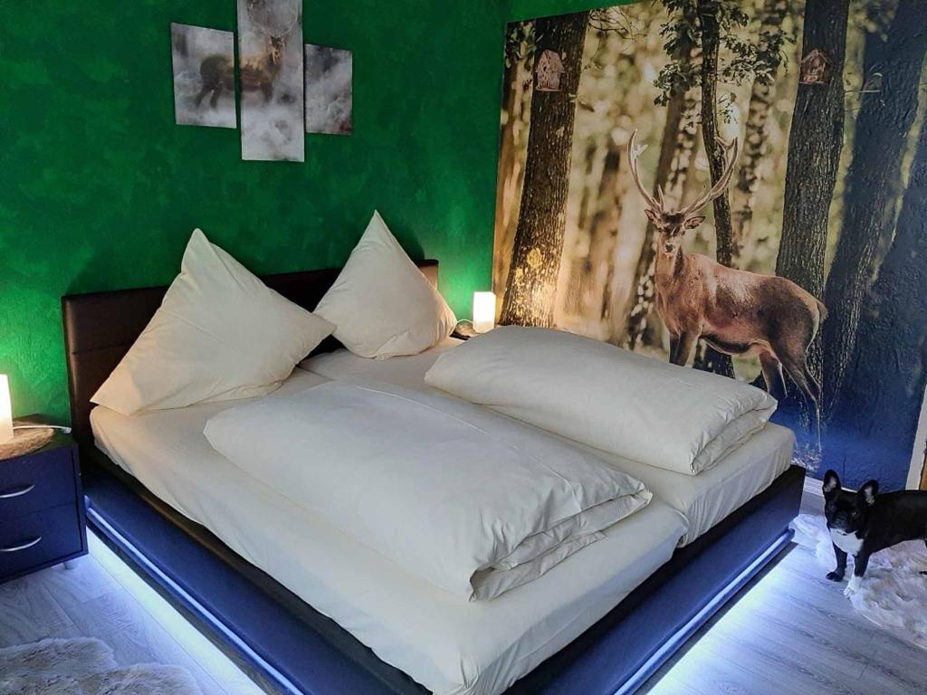Postel nebo postele na pokoji v ubytování Gästehaus Edelmann