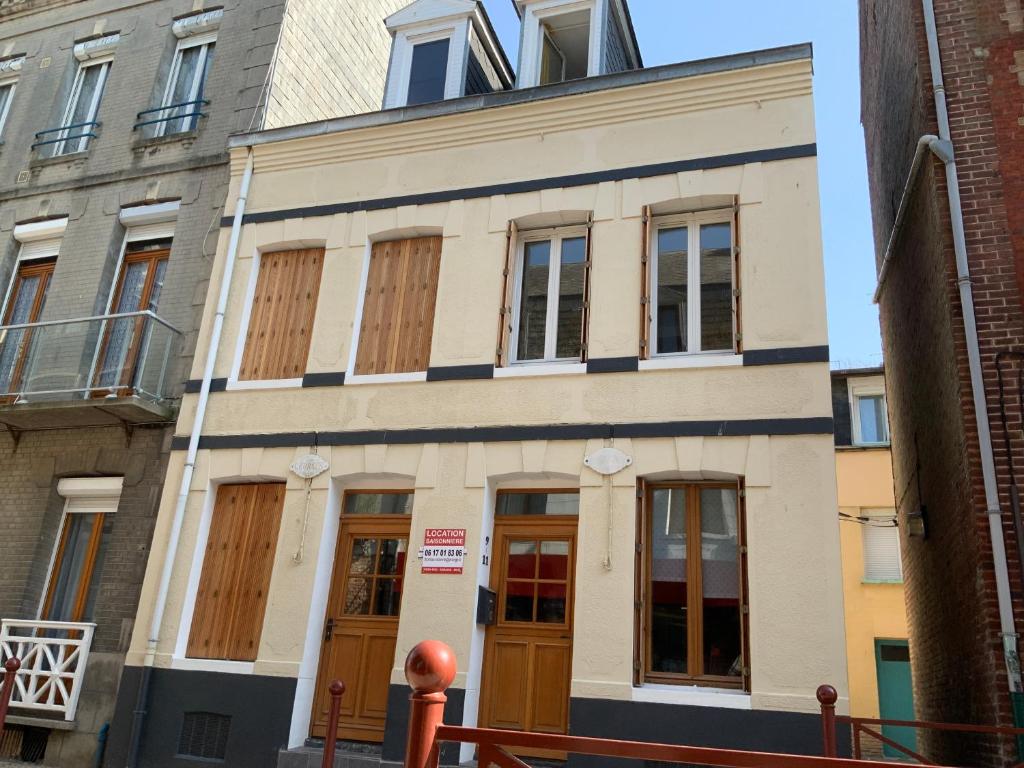 an old building on the corner of a street at Villa Georges in Le Tréport