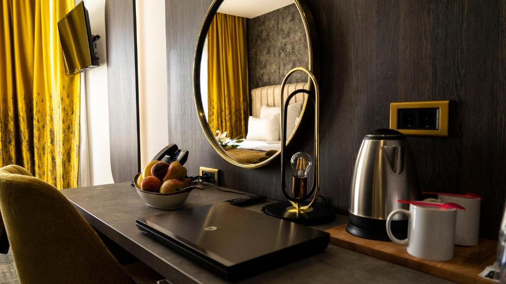 Příslušenství pro přípravu čaje a kávy v ubytování Hotel Pasha