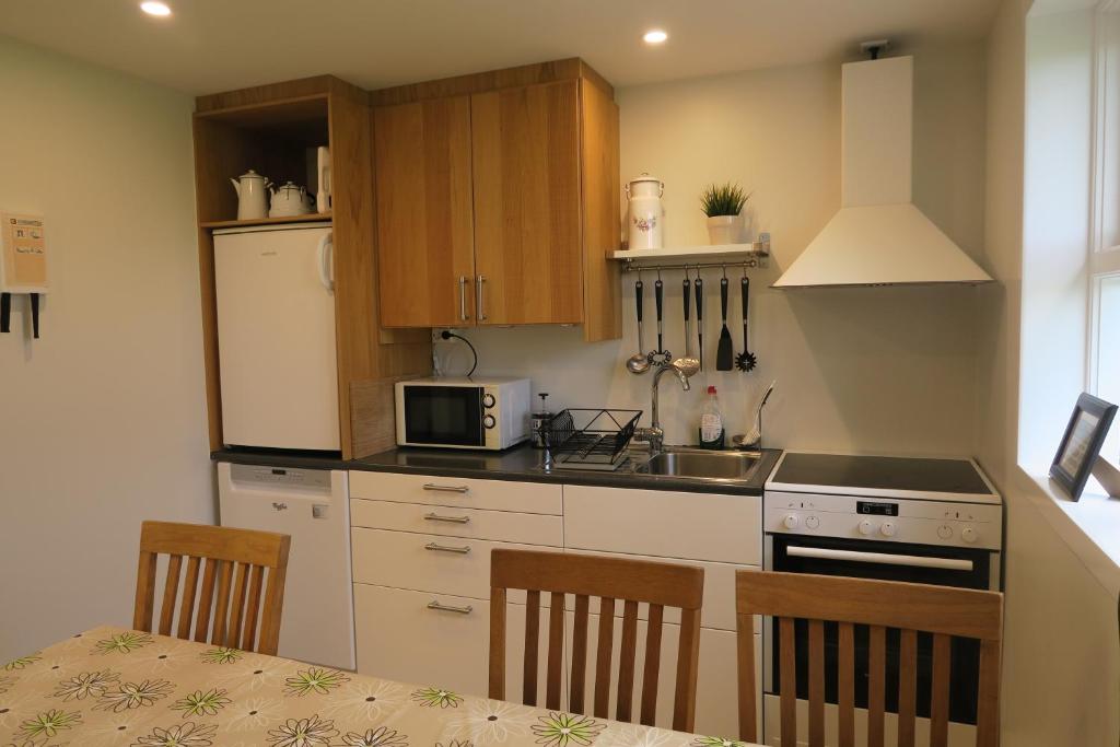 Kuchyň nebo kuchyňský kout v ubytování Dilksnes Guesthouse