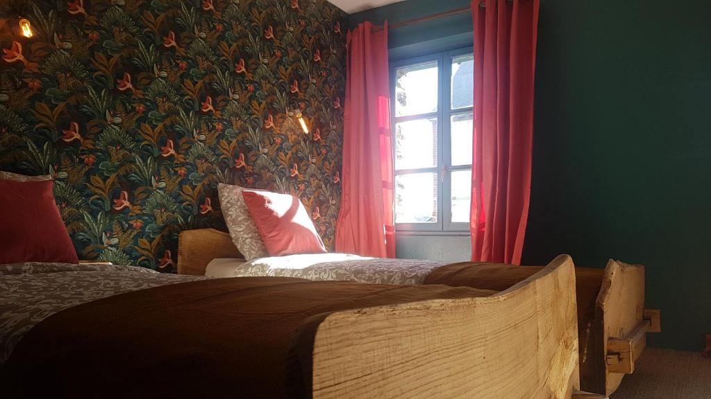 Krevet ili kreveti u jedinici u objektu Le Gîte de Caradoc